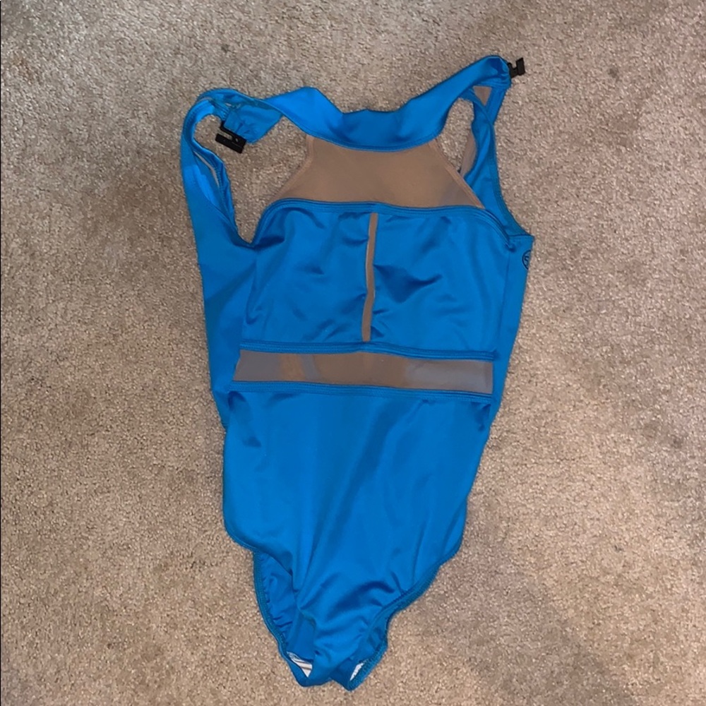 blue ballerina leotard with a design